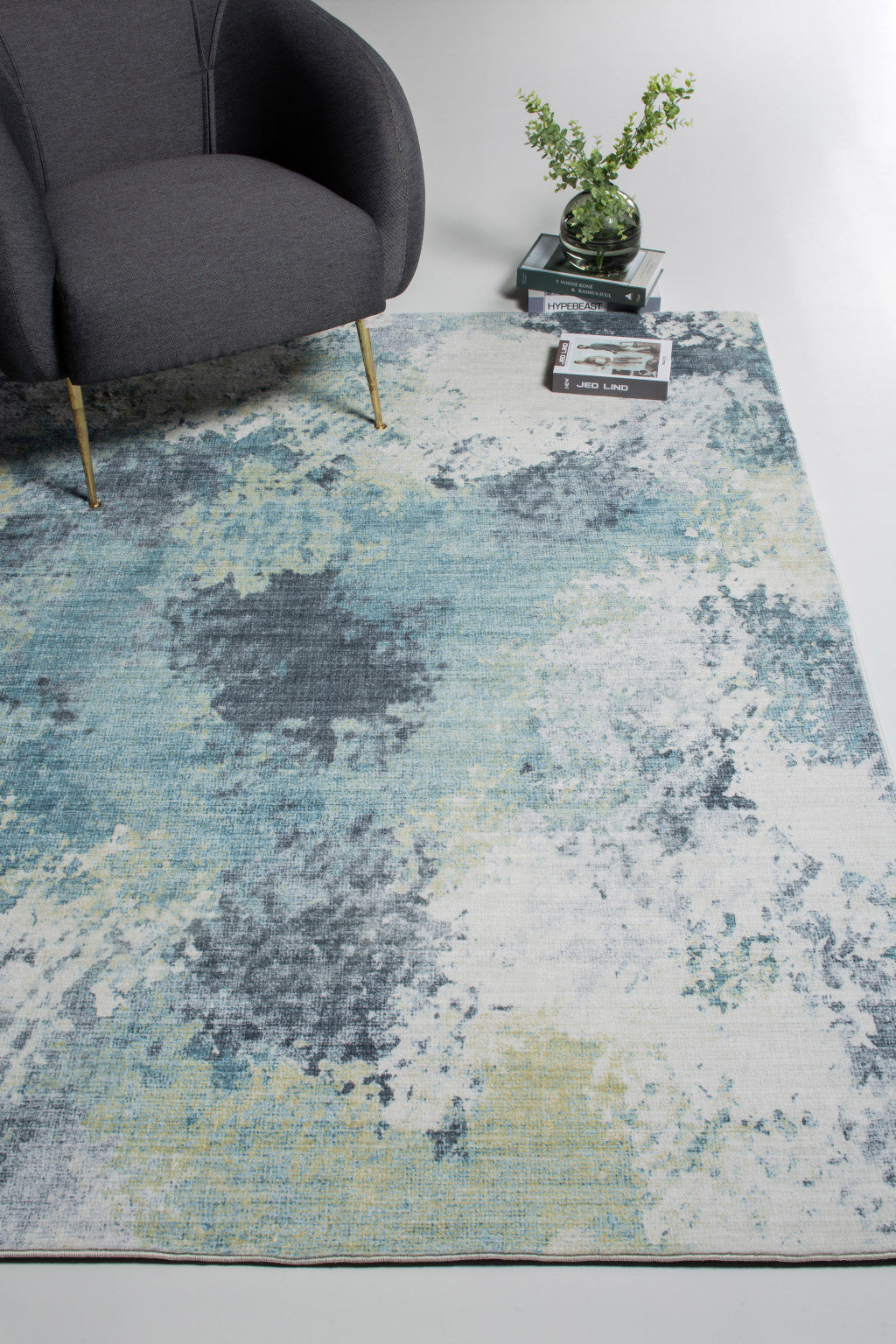 6' X 9' Blue and Ivory Abstract Area Rug