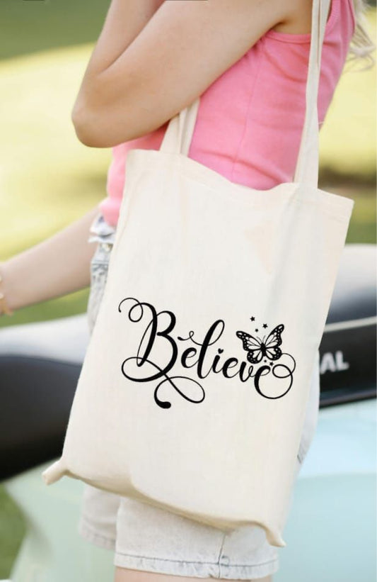 ALYONA Beige Canvas Tote Featuring ‘Believe’ in Script Font with