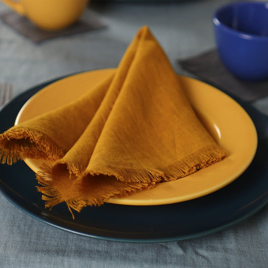 Mustard linen napkins set with tassels