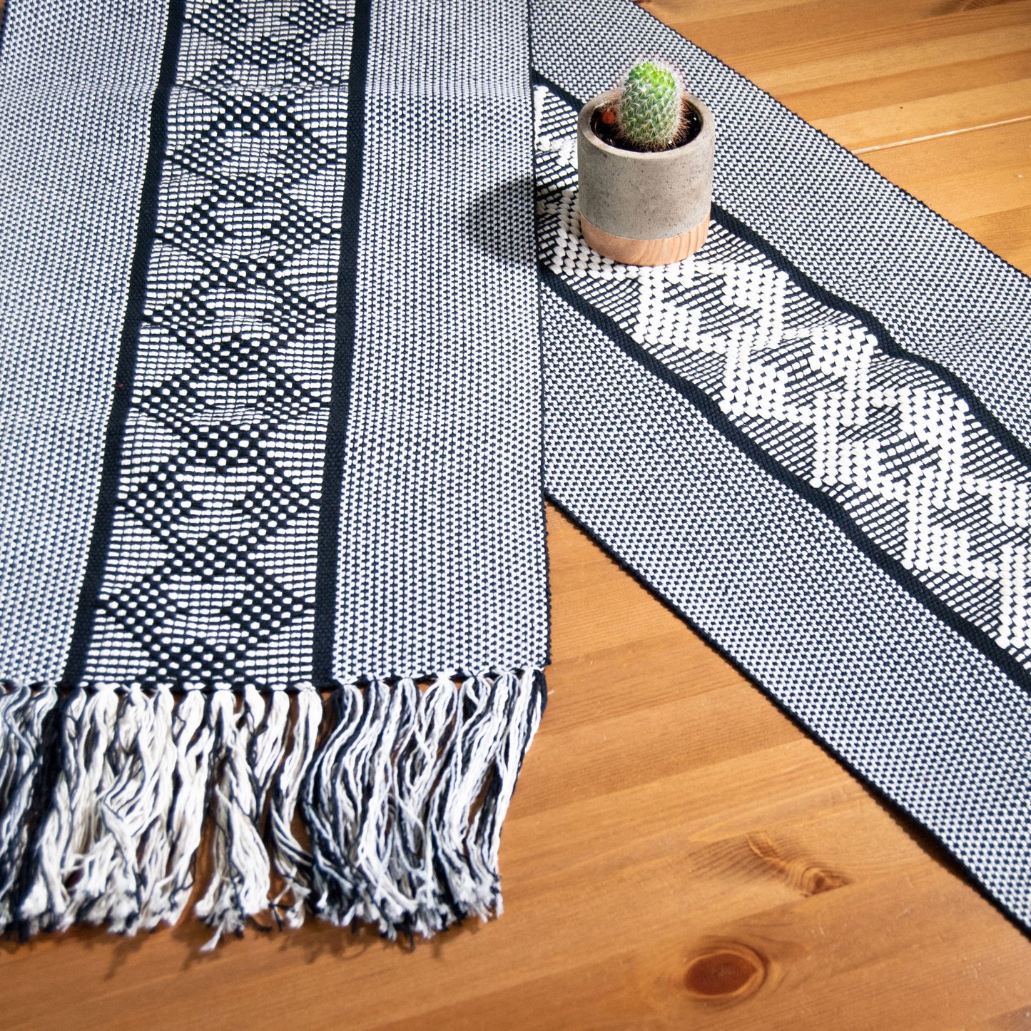 Jalieza Geometric Geometric Table Runner. Tulip Design in Coral.