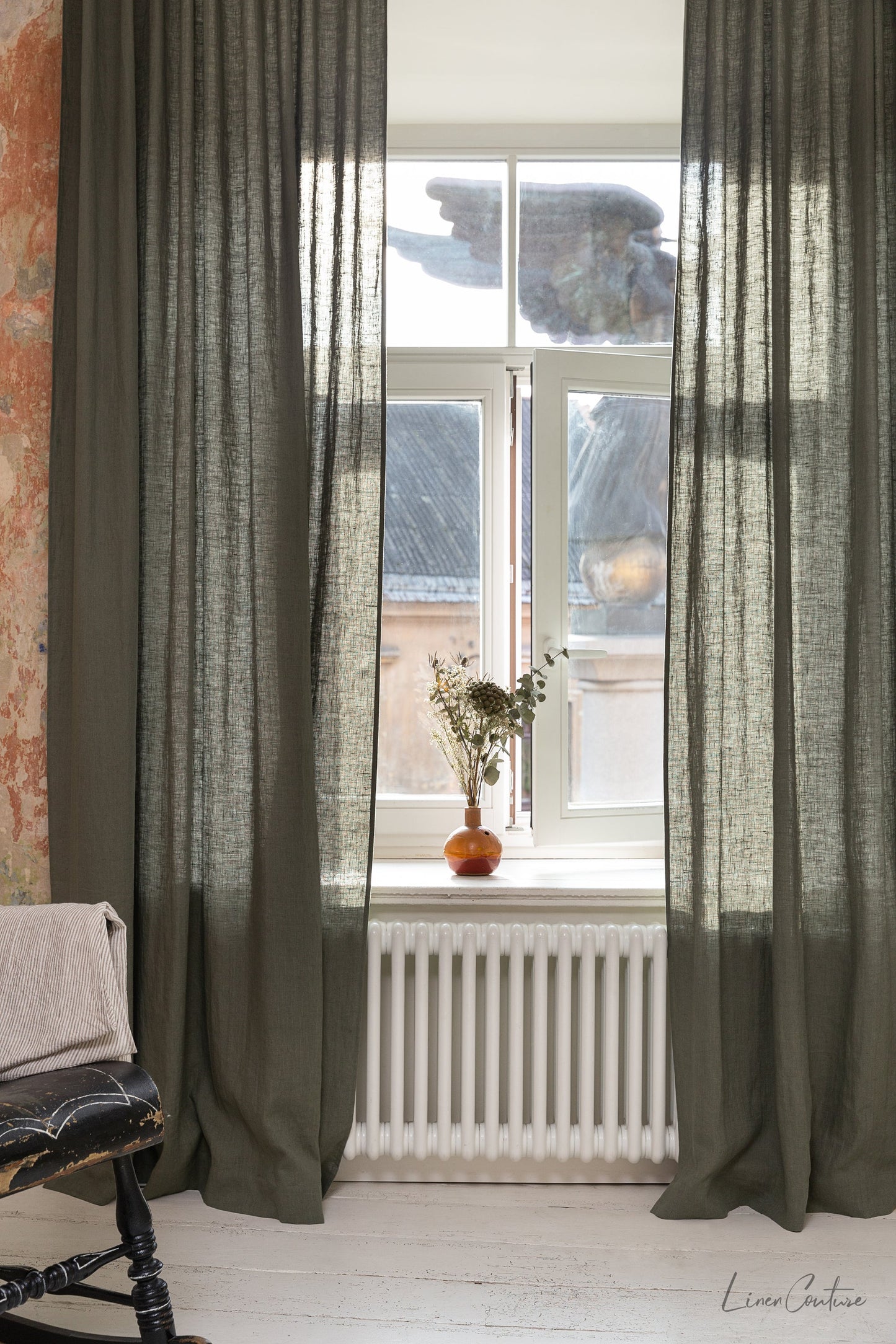 Linen curtain with pleating tape and crown in Safari green
