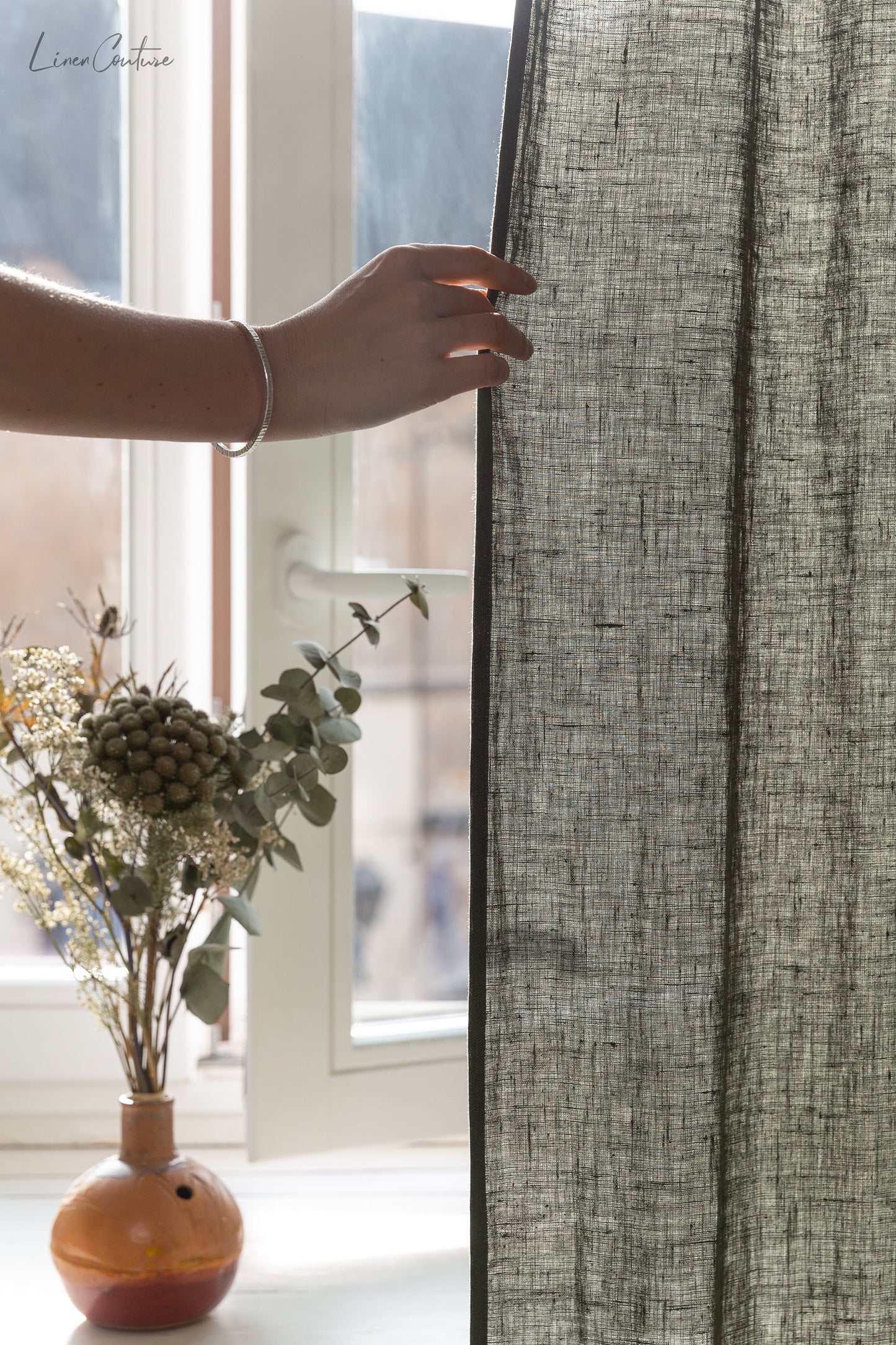 Linen curtain with pleating tape and crown in Safari green