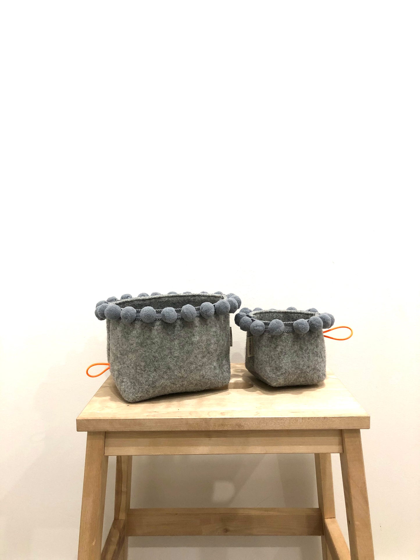 Saveplace® felty storage basket set with various colors pom poms