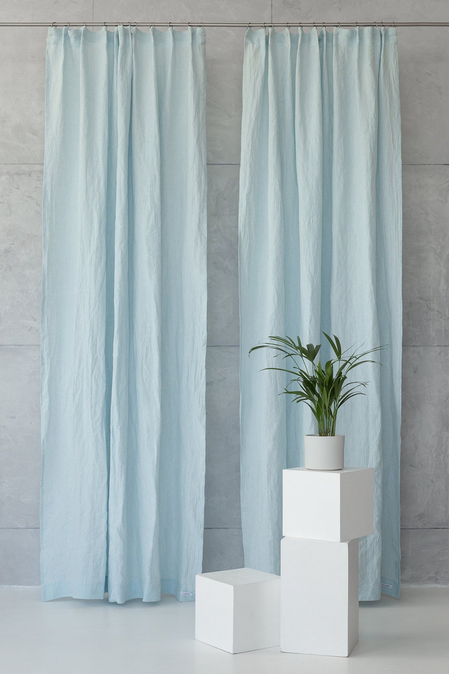 Linen curtain with pleating tape and crown in Safari green