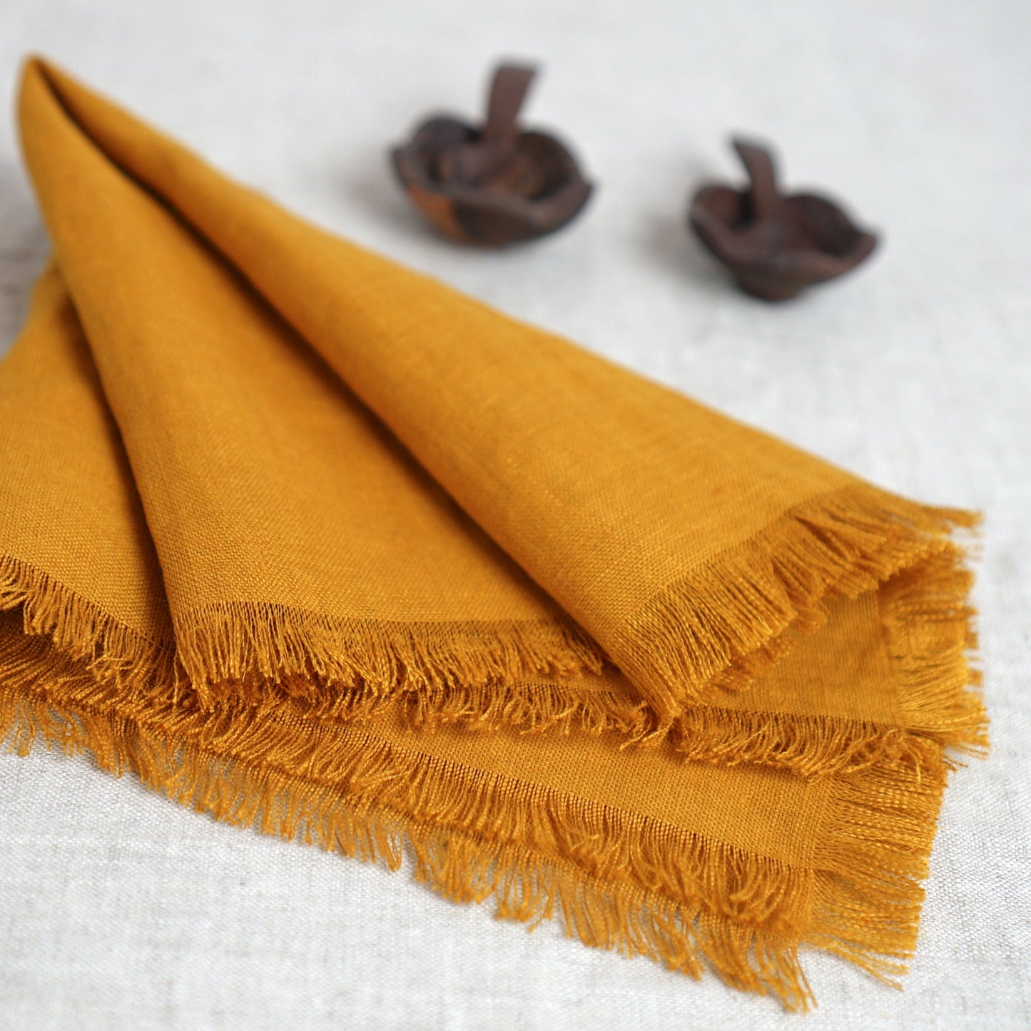 Mustard linen napkins set with tassels
