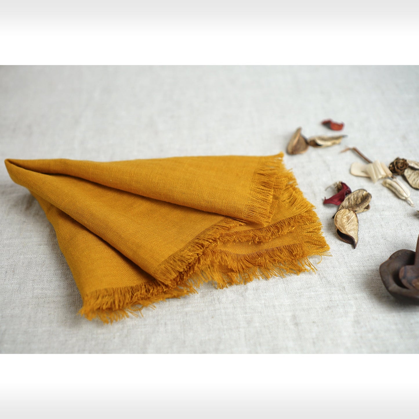 Mustard linen napkins set with tassels